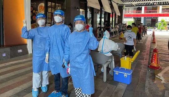 海口資規局黨員干部積極參加疫情防控志愿服務